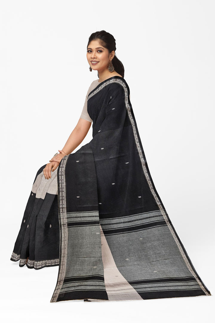 Black Handloom Soft Traditional Dhonekali Cotton Saree From Balaram Saha (handloom saree, cotton saree, handloom cotton saree, balaram saha online, handloom sarees, balaram saha handloom saree store photos, balaram saha handloom saree store, cotton handloom saree, bengal handloom sarees, pure cotton, cotton saree for women, cotton saree online)  https://www.cnbctv18.com/travel/get-your-durga-puja-wardrobe-sorted-5-best-places-to-shop-for-sarees-in-kolkata-14829551.htm