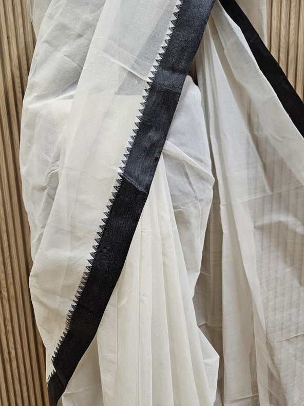 Off-White & Black Tangail Cotton Saree by Balaram Saha - (handloom saree, cotton saree, handloom cotton saree, balaram saha online, handloom sarees, balaram saha handloom saree store photos, balaram saha handloom saree store, cotton handloom saree, bengal handloom sarees, pure cotton, Zari border, handloom cotton saree with zari border, soft cotton saree with zari border, cotton saree for women, cotton saree online balaram saha, balaram saha handloom saree store, balaram saha saree, balaram saha online)