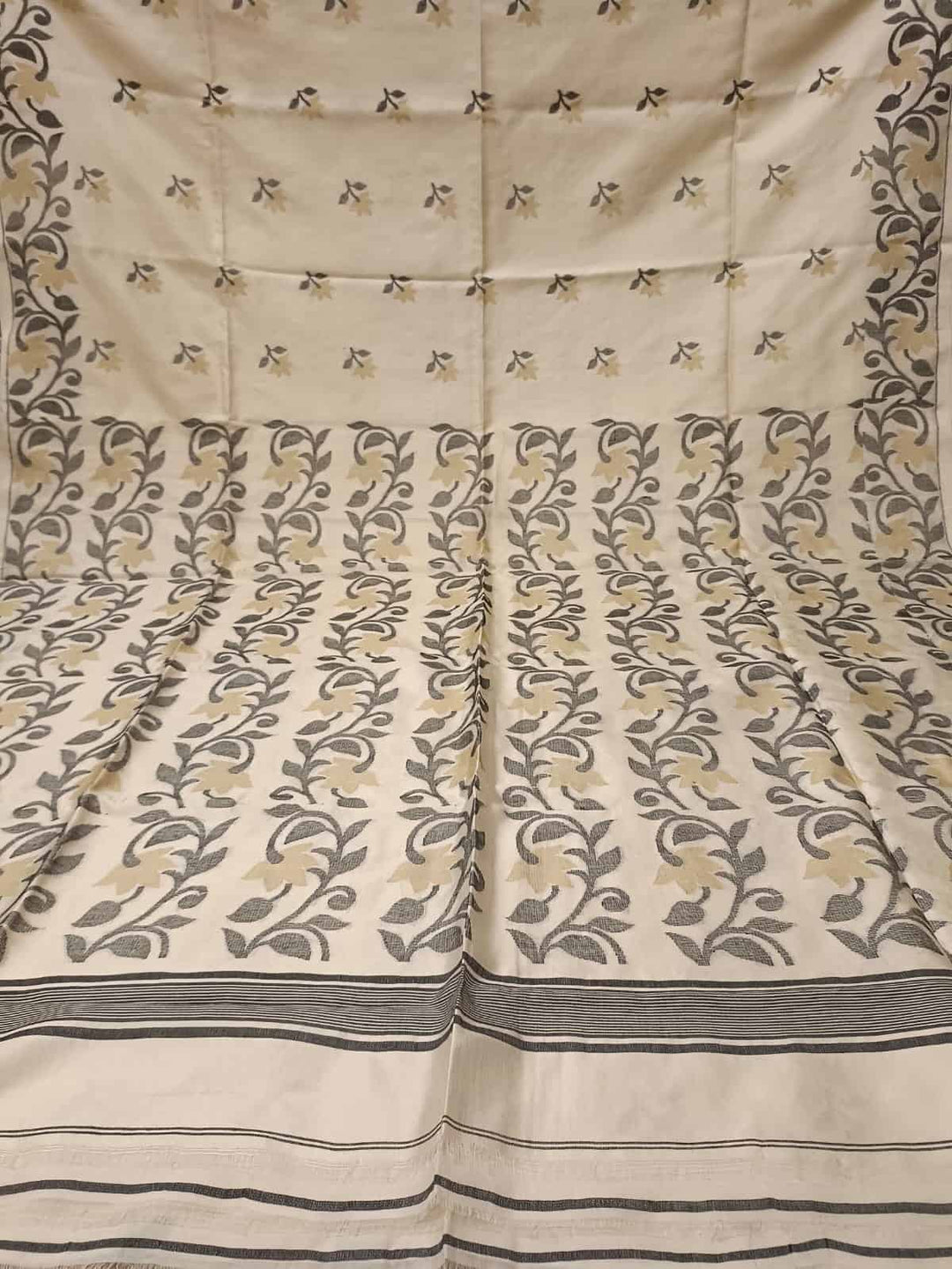 Off White & Black/Beige, Katan Silk Jamdani saree with floral weave on border & Aanchal. Floral motifs woven all over the body.  Blouse Piece included.