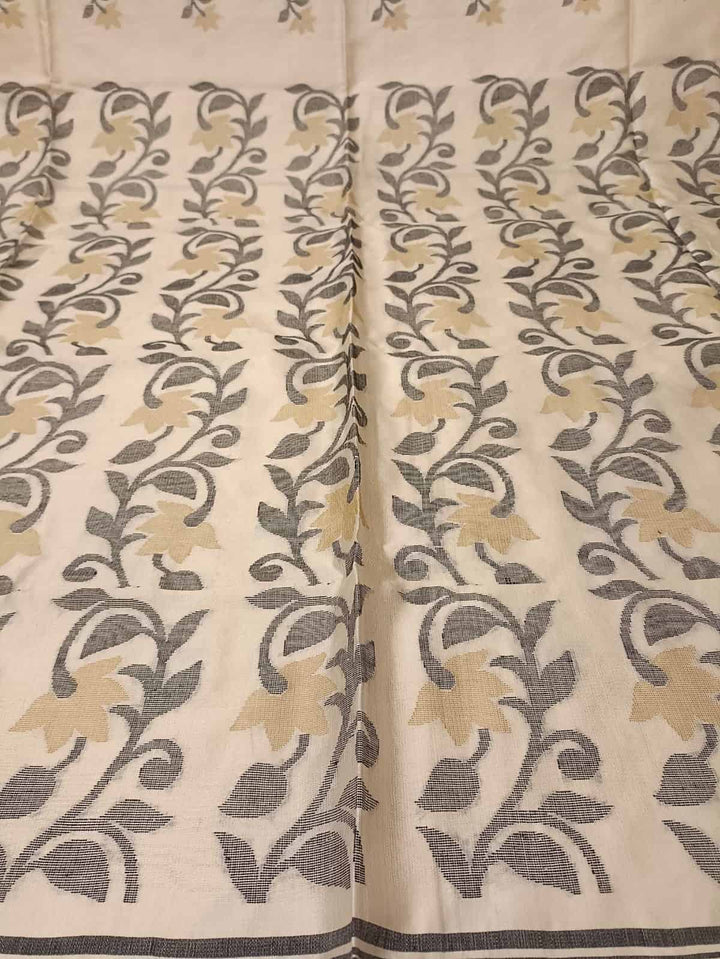 Off White & Black/Beige, Katan Silk Jamdani saree with floral weave on border & Aanchal. Floral motifs woven all over the body.  Blouse Piece included.