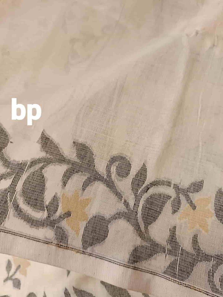 Off White & Black/Beige, Katan Silk Jamdani saree with floral weave on border & Aanchal. Floral motifs woven all over the body.  Blouse Piece included.
