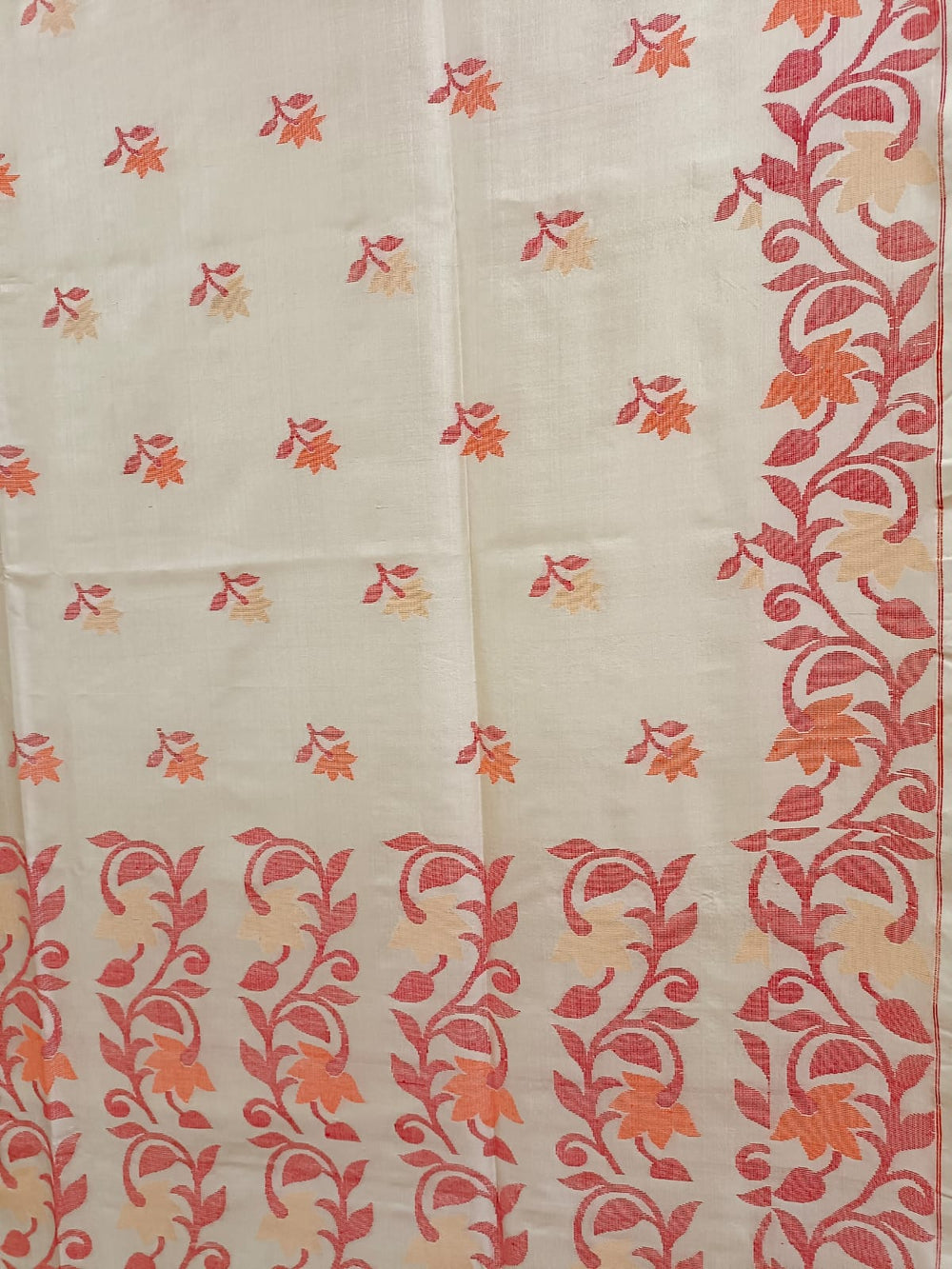 Off White & Red/Orange, Katan Silk Jamdani saree with floral weave on border & Aanchal. Floral motifs woven all over the body.  Blouse Piece included.