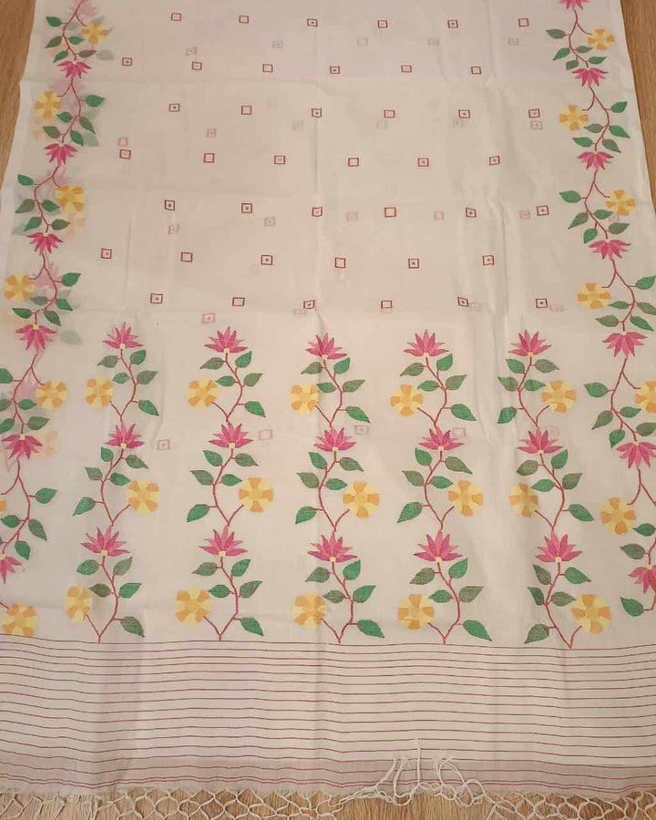 Pure Cotton handwoven jamdani saree in White & Multi Colour with a beautiful delicate & intricate floral weave on border & Aanchal. Geometric motifs woven all over the body. Blouse piece included.