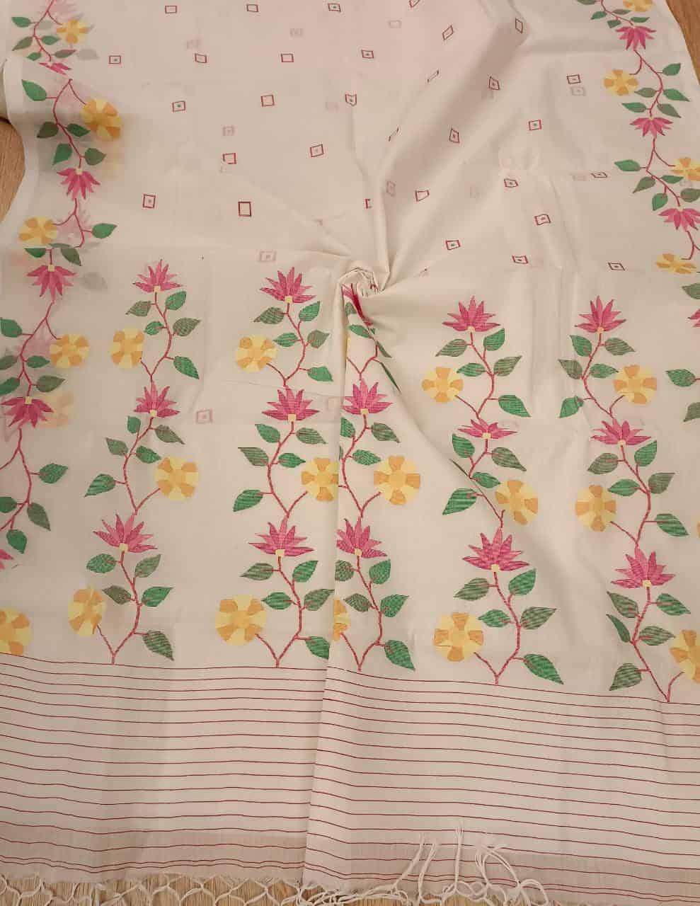 Pure Cotton handwoven jamdani saree in White & Multi Colour with a beautiful delicate & intricate floral weave on border & Aanchal. Geometric motifs woven all over the body. Blouse piece included.