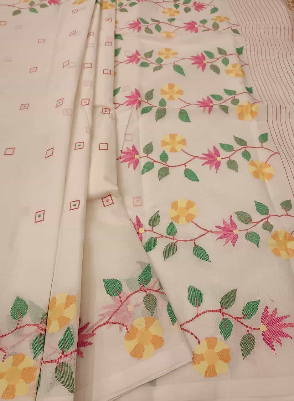 Pure Cotton handwoven jamdani saree in White & Multi Colour with a beautiful delicate & intricate floral weave on border & Aanchal. Geometric motifs woven all over the body. Blouse piece included.