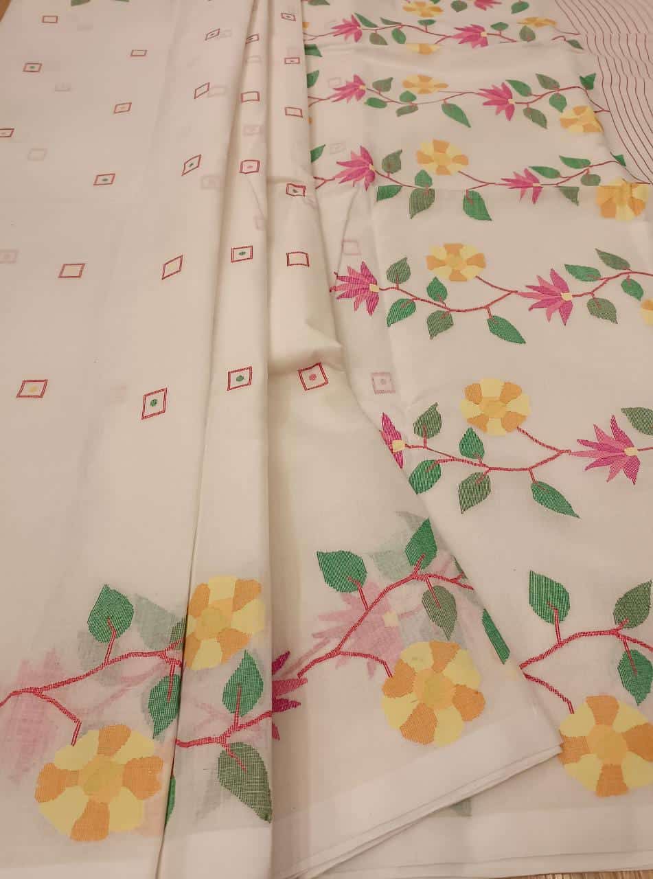 Pure Cotton handwoven jamdani saree in White & Multi Colour with a beautiful delicate & intricate floral weave on border & Aanchal. Geometric motifs woven all over the body. Blouse piece included.