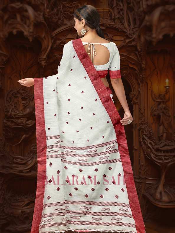 A Classic Revisited: Balaram Saha's White Handloom Cotton Saree with Red Contrast Border - (handloom saree, cotton saree, handloom cotton saree, balaram saha online, handloom sarees, balaram saha handloom saree store, cotton handloom saree, bengal handloom sarees, pure cotton, cotton saree for women, cotton saree online)   https://www.businessinsider.in/?r=US&IR=T