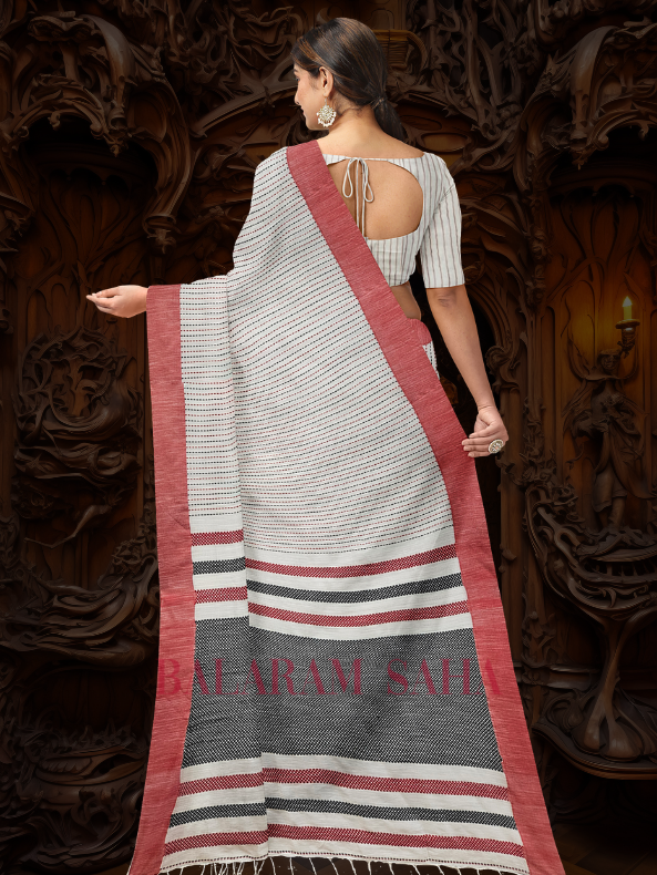 Balaram Saha: Timeless Elegance in White Handloom Cotton with Red & Black Kantha Stripes - (handloom saree, cotton saree, handloom cotton saree, balaram saha online, handloom sarees, balaram saha handloom saree store, cotton handloom saree, bengal handloom sarees, pure cotton, cotton saree for women, cotton saree online)    https://kotaku.com/