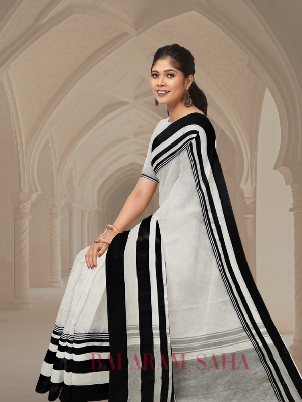 Balaram Saha's Off-White & Black Handloom Traditional Dhaonekali Cotton Saree - (handloom saree, cotton saree, handloom cotton saree, balaram saha online, handloom sarees, balaram saha handloom saree store photos, balaram saha handloom saree store, cotton handloom saree, bengal handloom sarees, pure cotton, cotton saree for women, cotton saree online, dhaonekali Cotton Saree, dhaonekali Cotton)
