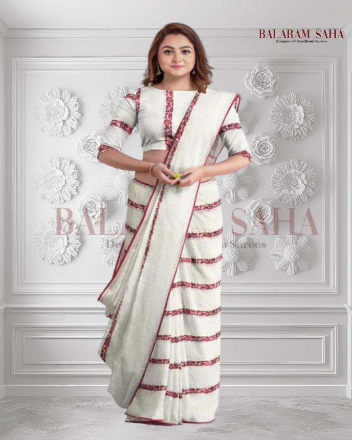Balaram Saha's White & Red Cotton Saree - cotton sarees, balaram saha online, latest handloom cotton sarees, cotton handloom saree, kolkata cotton saree, pure cotton, white cotton saree,cotton saree collection, bangladeshi cotton saree, saree cotton saree, bengal cotton sarees in Kolkata, bengali cotton saree, cotton saree with border, cotton saree online
