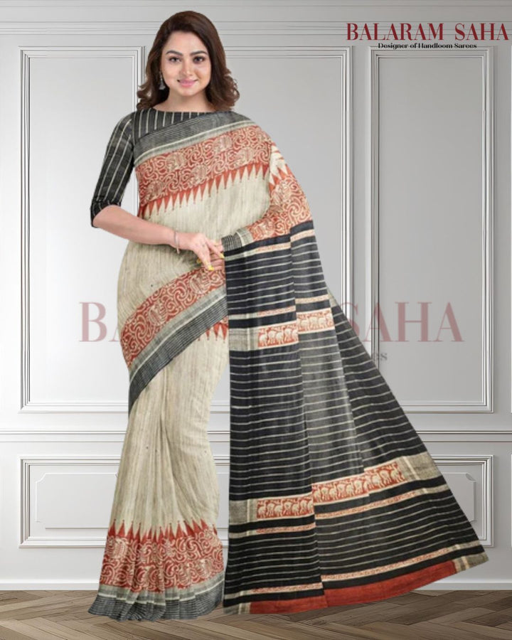 Beige & Black Handloom Ghich Tussar Printed Silk Saree by Balaram Saha - (handloom saree, silk saree, handloom silk saree, balaram saha online, silk sarees, silk handloom saree, bengal handloom sarees, pure silk, silk saree online, tussar silk saree, tussar silk, bengali silk saree)  https://www.sfgate.com/
