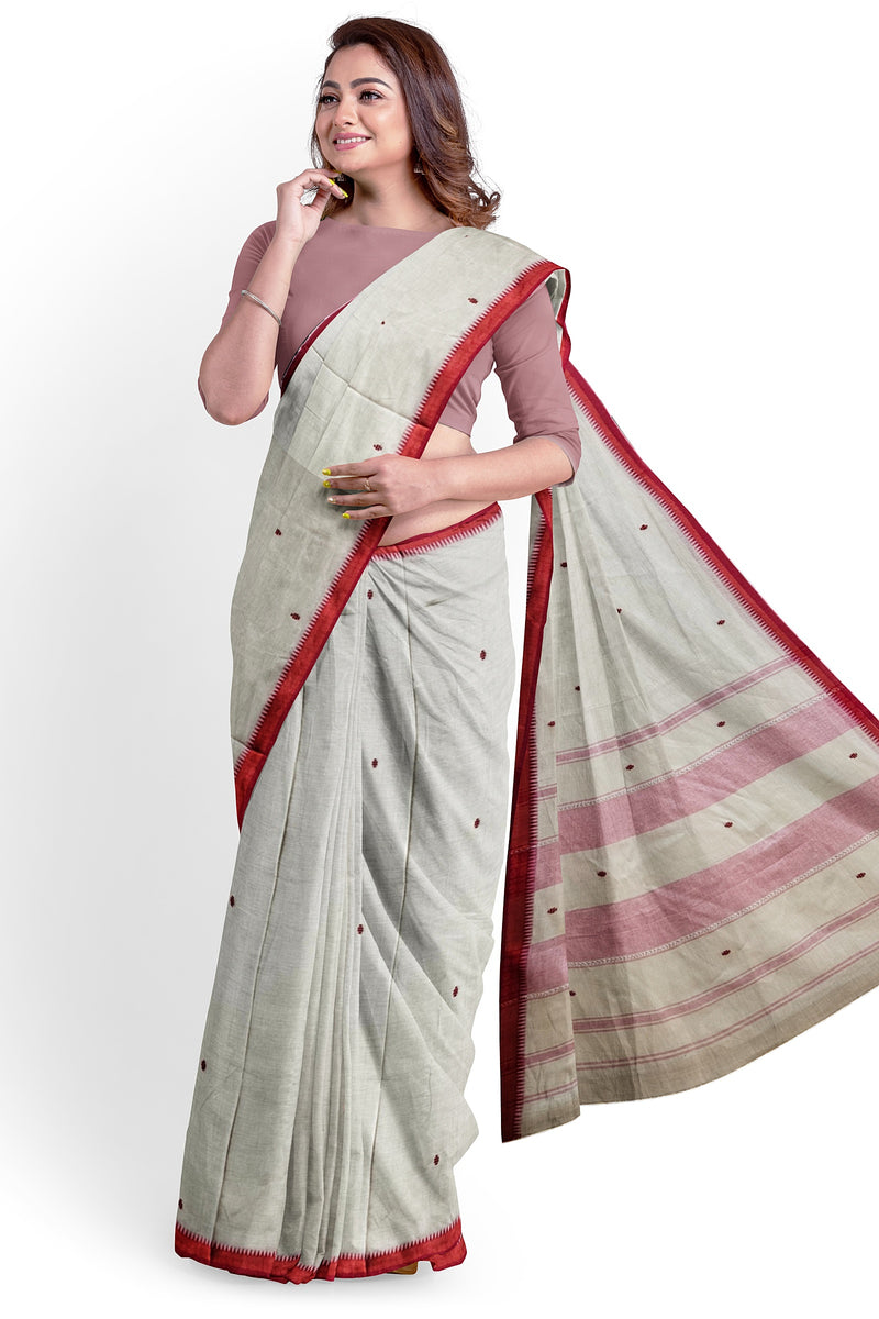 Beige & Red Handloom Traditional Dhonekali Cotton Saree From Balaram Saha (handloom saree, cotton saree, handloom cotton saree, balaram saha online, handloom sarees, balaram saha handloom saree store photos, balaram saha handloom saree store, cotton handloom saree, bengal handloom sarees, pure cotton, cotton saree for women, cotton saree online) https://creativecommons.org/