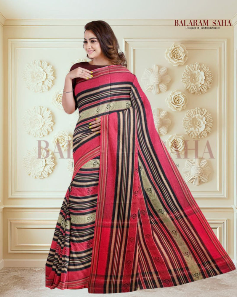 Black Soft Handloom Traditional Dhonekali Cotton Saree From Balaram Saha (handloom saree, cotton saree, handloom cotton saree, balaram saha online, handloom sarees, balaram saha handloom saree store photos, balaram saha handloom saree store, cotton handloom saree, bengal handloom sarees, pure cotton, cotton saree for women, cotton saree online) https://www.istockphoto.com/