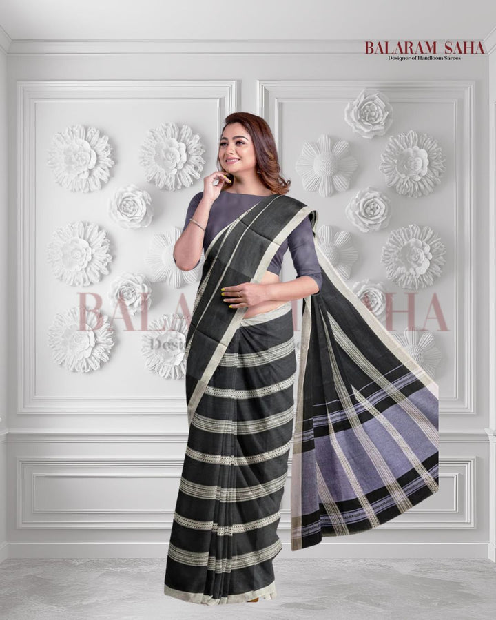Bold & Beautiful: Balaram Saha's Black & White Soft Handloom Dhonekali Saree Balaram Saha https://taleof2backpackers.com/kolkata-travel-guide/
