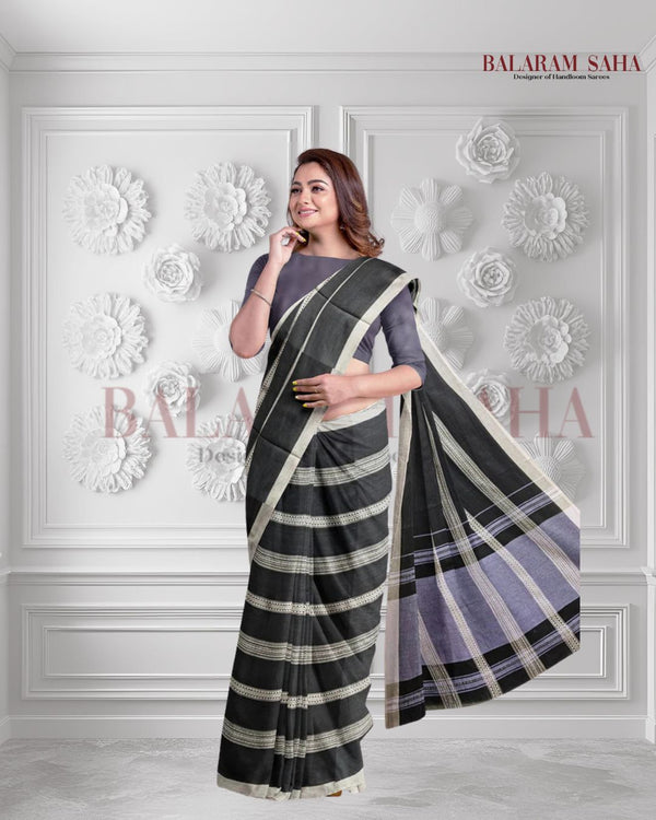 Bold & Beautiful: Balaram Saha's Black & White Soft Handloom Dhonekali Saree Balaram Saha https://taleof2backpackers.com/kolkata-travel-guide/