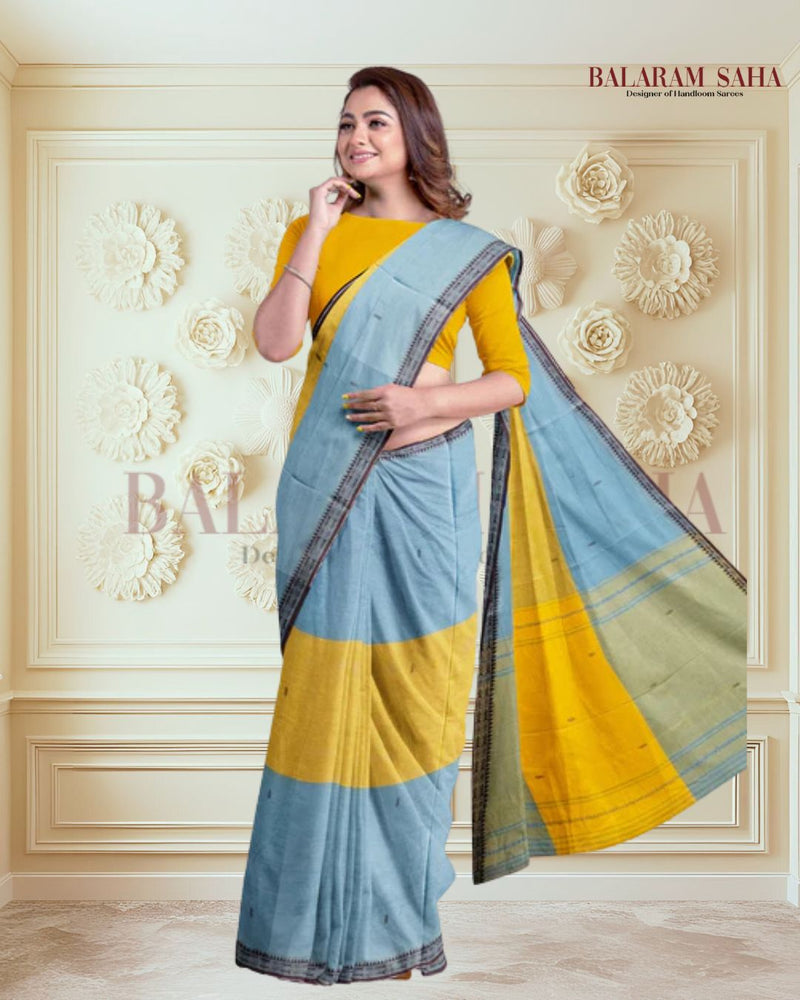 Blue & Yellow Soft Handloom Dhonekali Traditional Cotton Saree Of Balaram Saha (handloom saree, cotton saree, handloom cotton saree, balaram saha online, handloom sarees, balaram saha handloom saree store photos, balaram saha handloom saree store, cotton handloom saree, bengal handloom sarees, pure cotton, cotton saree for women, cotton saree online)  https://www.istockphoto.com/
