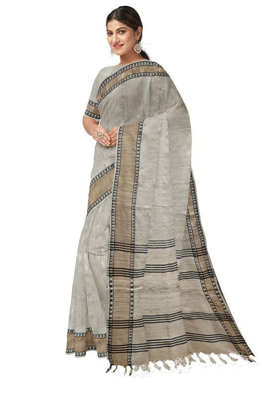 Cream Handloom Tussar Silk Saree with Gold Zari & Black Border by Balaram Saha - (handloom saree, silk saree, handloom silk saree, balaram saha online, silk sarees, silk handloom saree, bengal handloom sarees, pure silk, tussar silk saree, pure tussar silk sarees, tussar silk sarees, silk saree online)   https://www.newyorker.com/