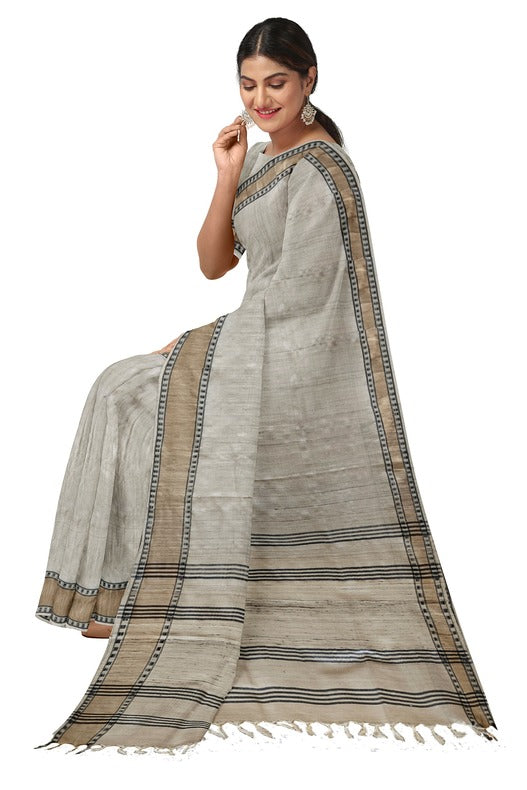 Cream Handloom Tussar Silk Saree with Gold Zari & Black Border by Balaram Saha - (handloom saree, silk saree, handloom silk saree, balaram saha online, silk sarees, silk handloom saree, bengal handloom sarees, pure silk, tussar silk saree, pure tussar silk sarees, tussar silk sarees, silk saree online)    https://sciencedaily.com/