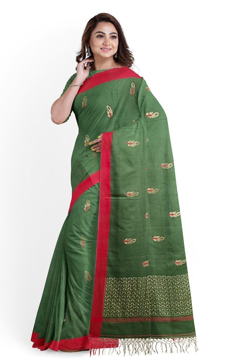 Green Soft & Fine Handloom Cotton Saree With Red Border Of Balaram Saha (handloom saree, cotton saree, handloom cotton saree, balaram saha online, handloom sarees, balaram saha handloom saree store photos, balaram saha handloom saree store, cotton handloom saree, bengal handloom sarees, pure cotton, Zari border, handloom cotton saree with zari border, soft cotton saree with zari border, cotton saree for women, cotton saree online)  https://balaramsaha.com/collections/jamdani-saree