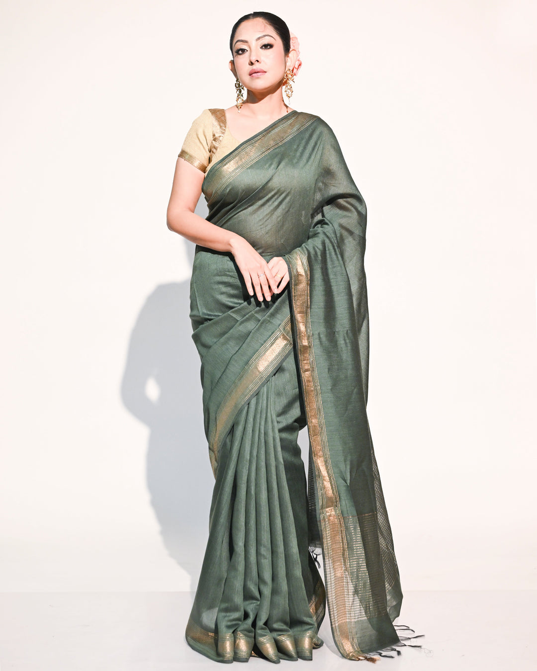 Bottle Green & Gold Handloom Tussar Silk Saree with Woven Zari Border & Aanchal Balaram Saha