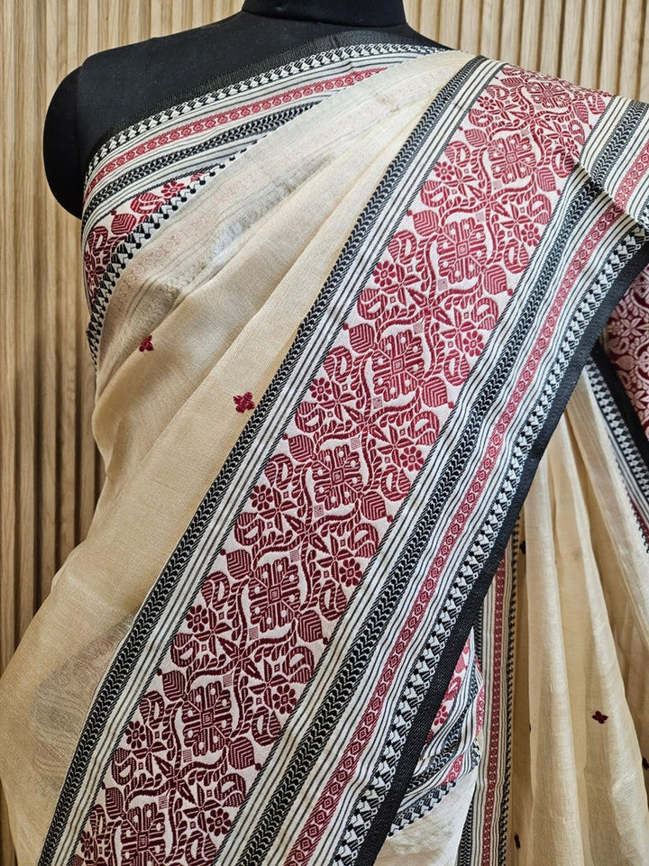 Beige Handloom Tussar Silk Saree with Black & Maroon Contrast Woven Border and Aanchal Balaram Saha