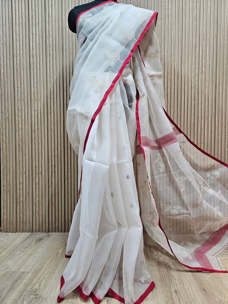 Off-White Muslin Jamdani Silk Saree Features a Striking Red Contrast Border Balaram Saha