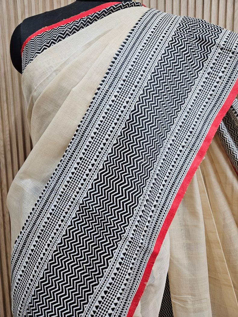 Beige and Black Handloom Tussar Silk Saree with Woven Border Balaram Saha