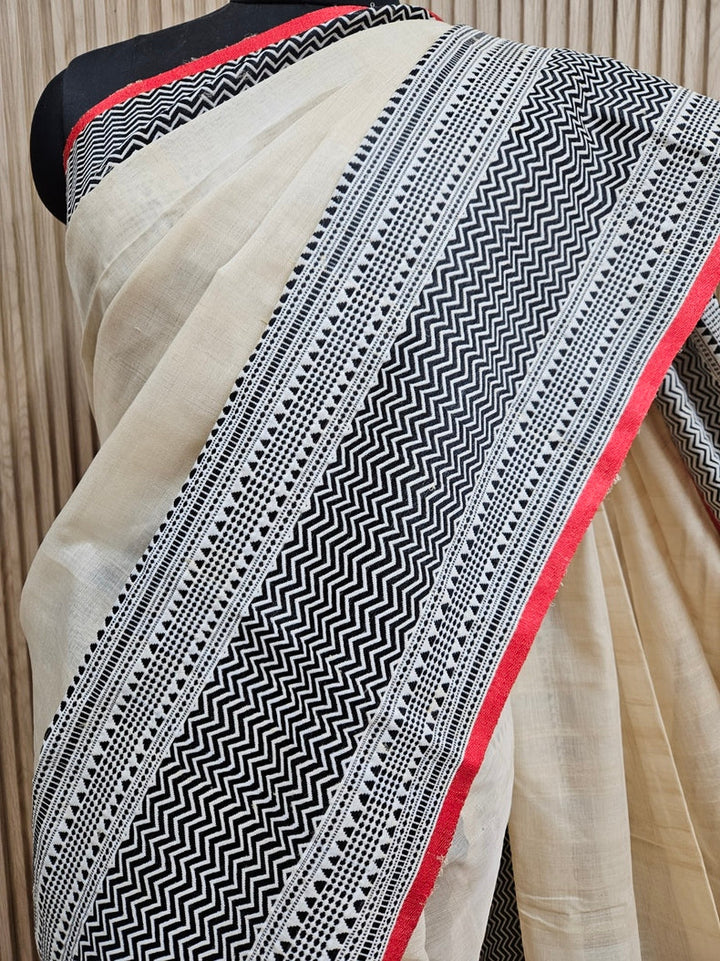 Beige and Black Handloom Tussar Silk Saree with Woven Border Balaram Saha