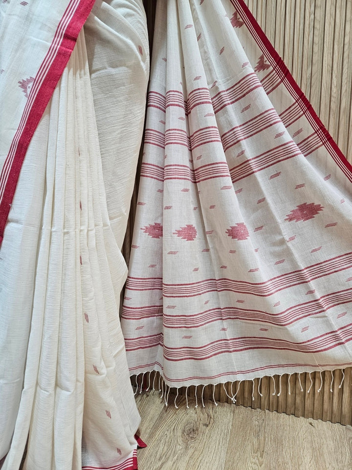 Discover the Timeless Elegance of our Off White & Red Handloom Handwoven Cotton Jamdani Saree
