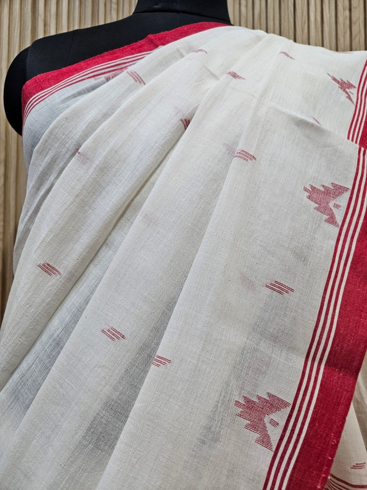 Discover the Timeless Elegance of our Off White & Red Handloom Handwoven Cotton Jamdani Saree