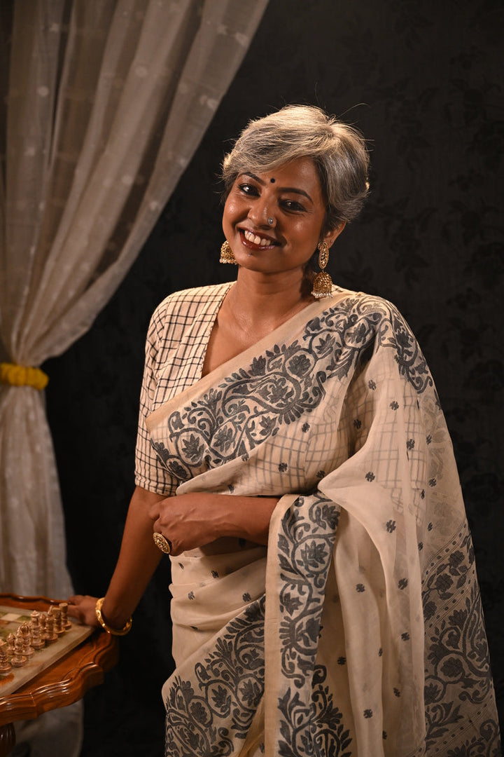 Off-White & Black Handwoven Muslin Silk Saree with Floral Paisley Jamdani Border Balaram Saha