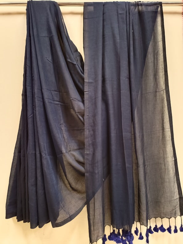 Drape yourself in the epitome of sophistication with our Handloom Mull Cotton Saree(Navy) Balaram Saha
