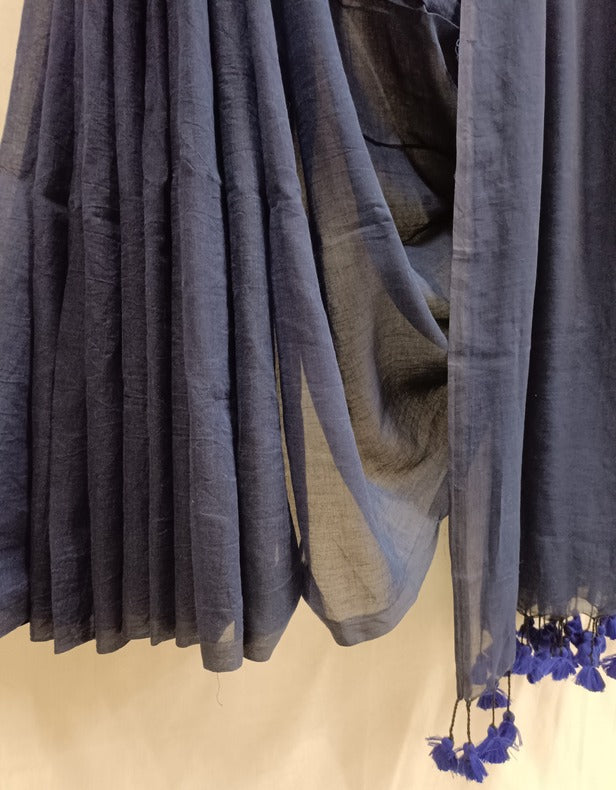 Drape yourself in the epitome of sophistication with our Handloom Mull Cotton Saree(Navy) Balaram Saha