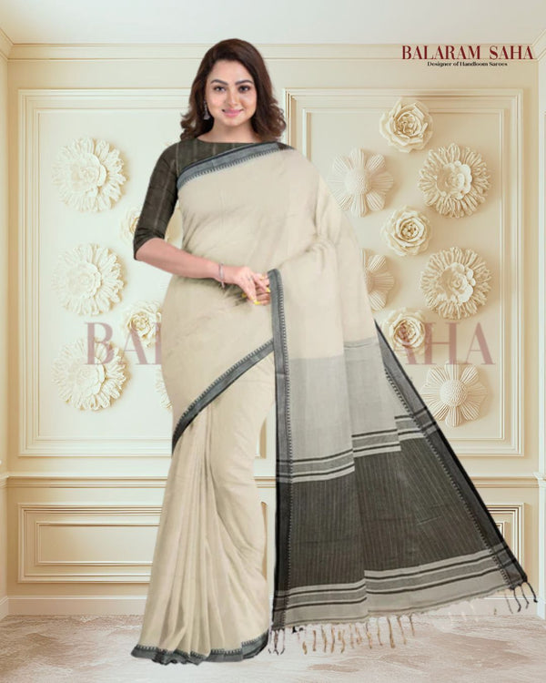 Off-White & Black Handloom Fine Cotton Saree With Black Border Of Balaram Saha (handloom saree, cotton saree, handloom cotton saree, balaram saha online, handloom sarees, balaram saha handloom saree store photos, balaram saha handloom saree store, cotton handloom saree, bengal handloom sarees, pure cotton, cotton saree for women, cotton saree online)    https://edition.cnn.com/