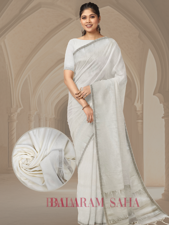 Off White Quality Soft Handloom Mul Cotton Saree With Silver Border by Balaram Saha - (handloom saree, cotton saree, handloom cotton saree, balaram saha online, handloom sarees, balaram saha handloom saree store photos, balaram saha handloom saree store, cotton handloom saree, bengal handloom sarees, pure cotton, cotton saree for women, cotton saree online) https://www.clarin.com/
