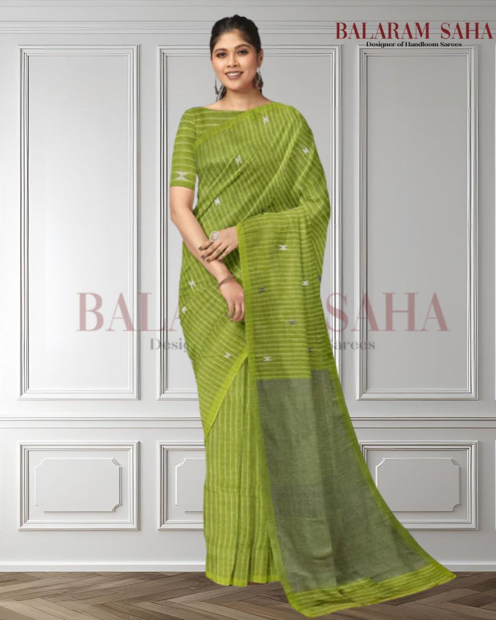 Olive Green & Grey Handloom Soft Cotton Kantha Weave Saree From Balaram Saha (handloom saree, cotton saree, handloom cotton saree, balaram saha online, handloom sarees, balaram saha handloom saree store photos, balaram saha handloom saree store, cotton handloom saree, bengal handloom sarees, pure cotton, cotton saree for women, cotton saree online)  https://www.iconosquare.com/