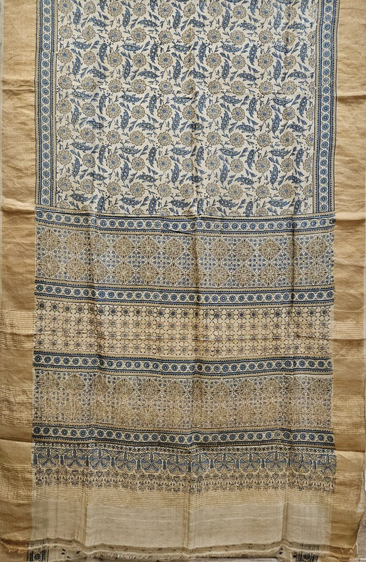 Original Ajrak Print Beige & Blue Pure Handloom Tussar Silk Saree (tussar silk saree, handloom saree, cotton saree, handloom cotton saree, balaram saha online, handloom sarees, balaram saha handloom saree store photos, balaram saha handloom saree store, cotton handloom saree, bengal handloom sarees, pure cotton, cotton saree for women, cotton saree online)  https://www.reddit.com/