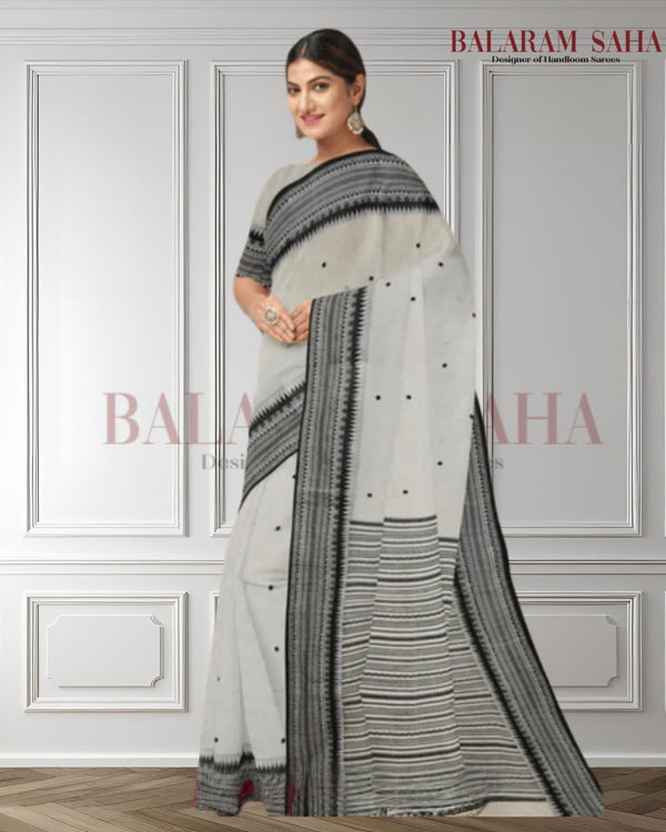  The Balaram Saha Signature: White and Black Handloom Soft Cotton Saree - (handloom saree, cotton saree, handloom cotton saree, balaram saha online, handloom sarees, cotton handloom saree, bengal handloom sarees)    https://www.istockphoto.com/