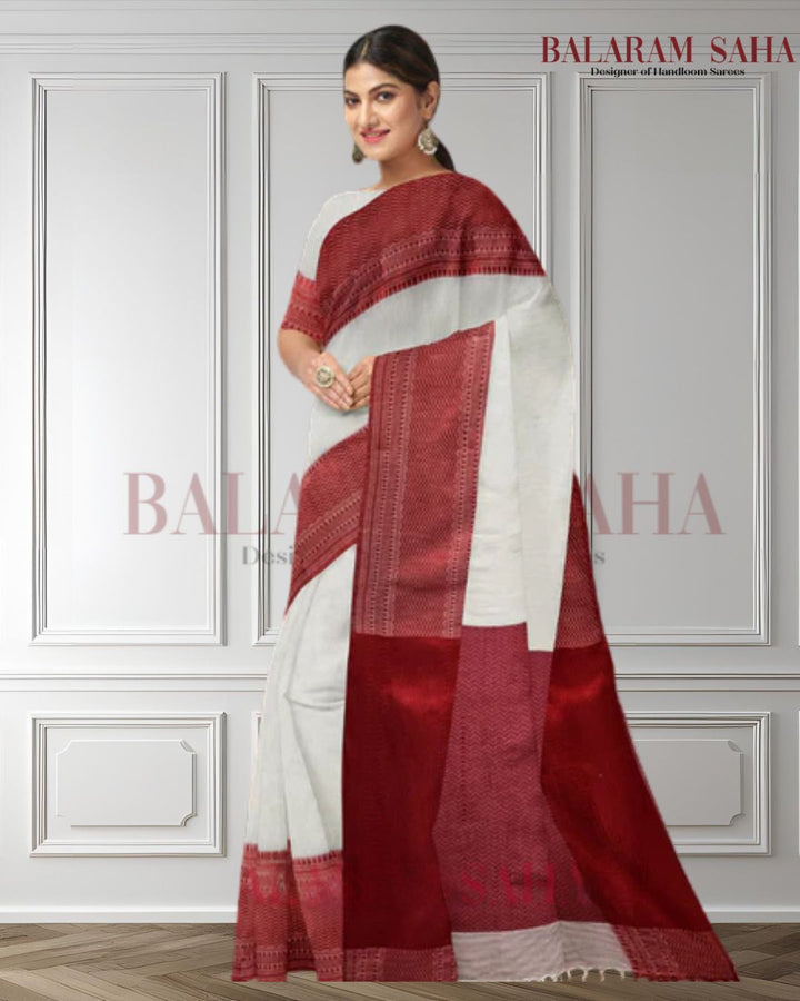 Balaram Saha's Off White Handloom Cotton Saree with Red Contrast Border - (handloom saree, cotton saree, handloom cotton saree, balaram saha online, handloom sarees, cotton handloom saree, bengal handloom sarees, pure cotton, cotton saree for women, cotton saree online)     https://www.cambridge.org/
