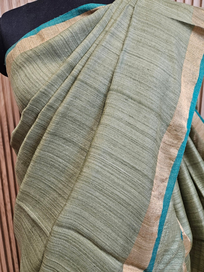 Elegant Pista Green Handloom Matka Silk Saree with Golden Zari & Blue Contrast Border Balaram Saha