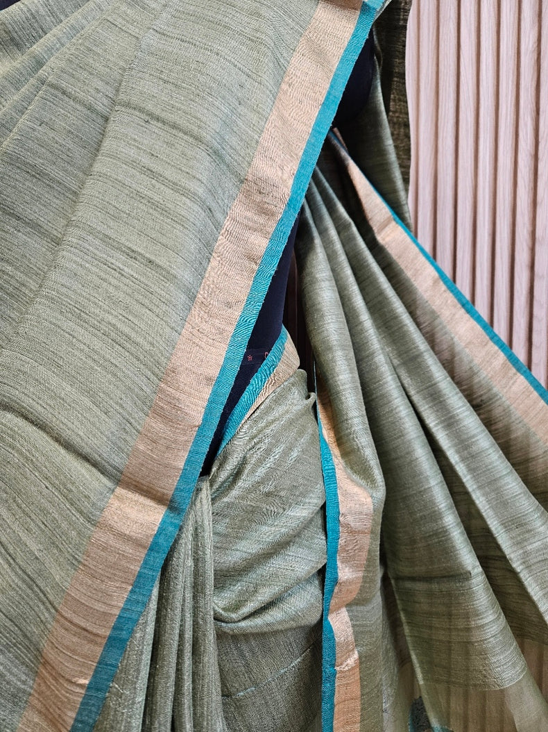 Elegant Pista Green Handloom Matka Silk Saree with Golden Zari & Blue Contrast Border Balaram Saha