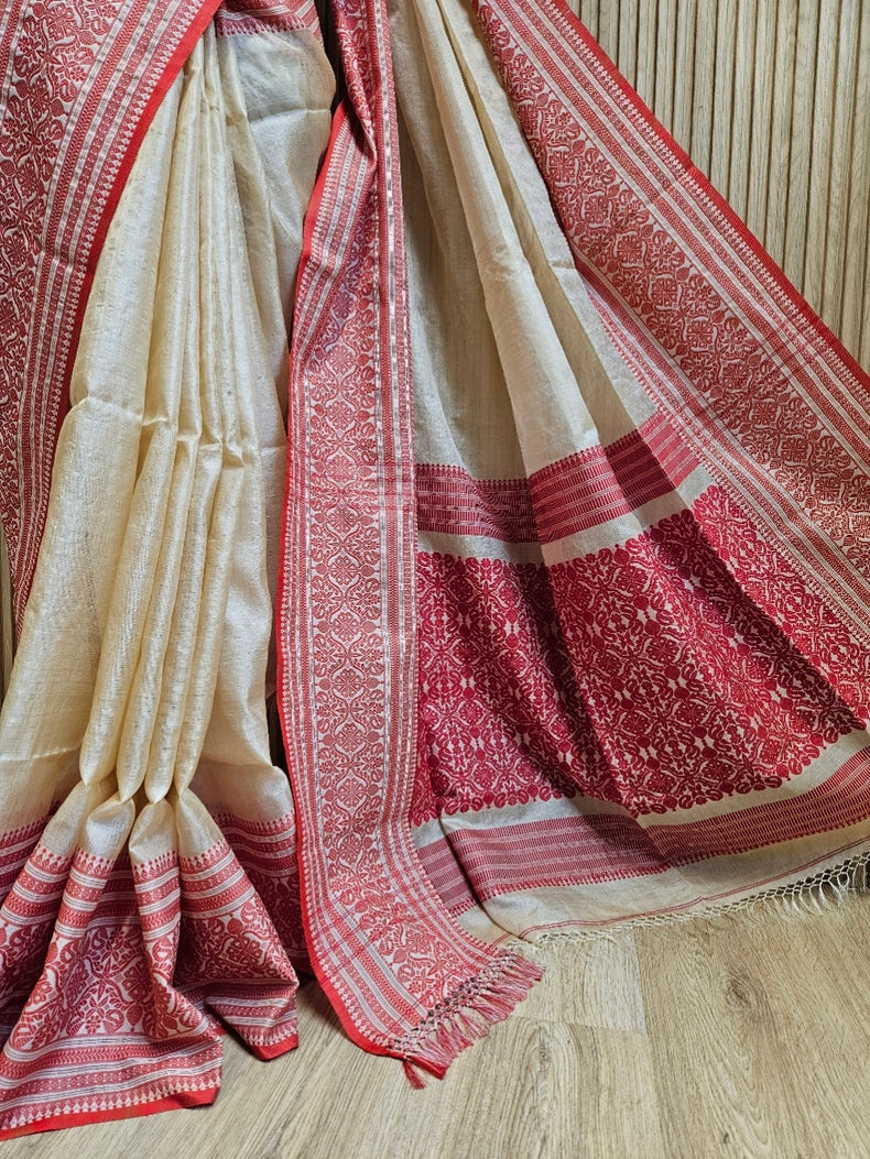 Beige Handloom Tussar Silk Saree with Red Contrast Woven Border and Aanchal Balaram Saha