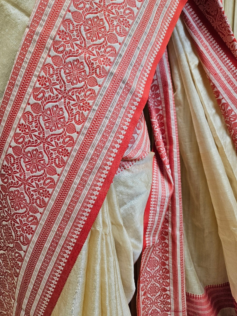 Beige Handloom Tussar Silk Saree with Red Contrast Woven Border and Aanchal Balaram Saha