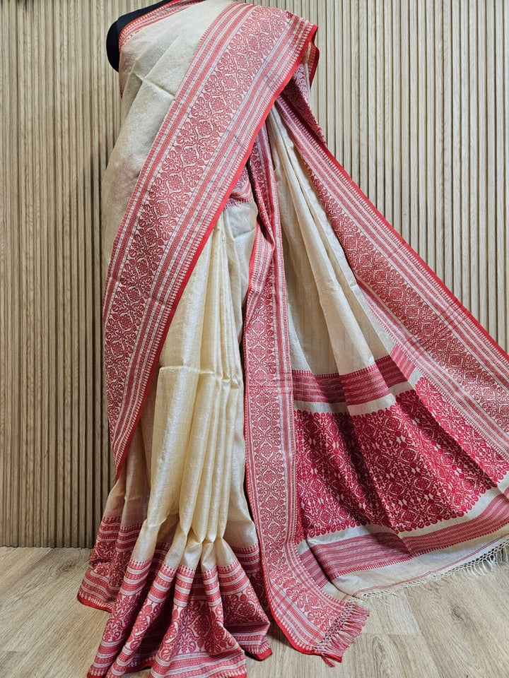 Beige Handloom Tussar Silk Saree with Red Contrast Woven Border and Aanchal Balaram Saha