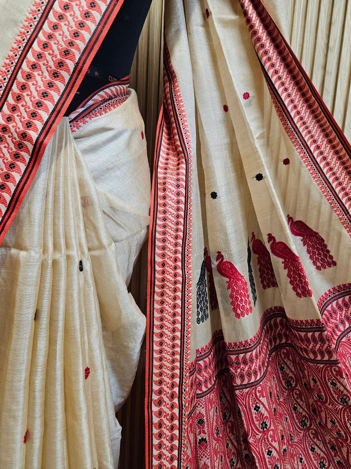 Beige Handloom Tussar Silk Saree with Black & Red Contrast Woven Border and Aanchal Balaram Saha