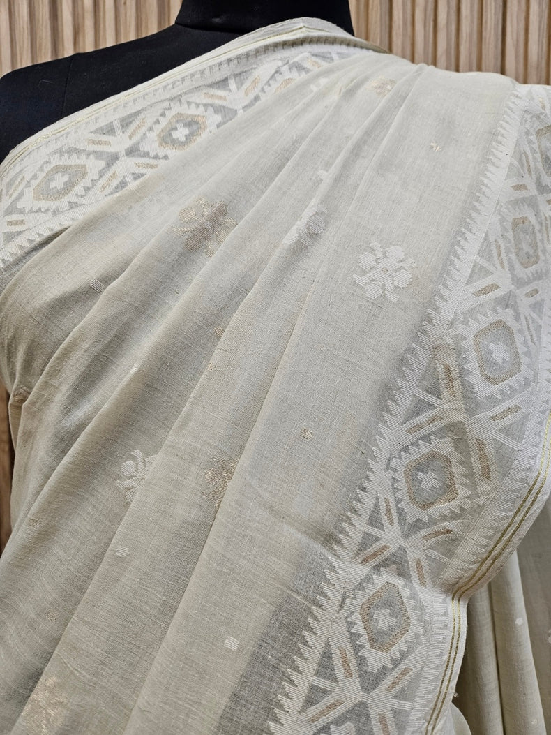 Elegance in Every Thread – Cream & White Handspun Cotton Jamdani Saree with Gold Zari Balaram Saha