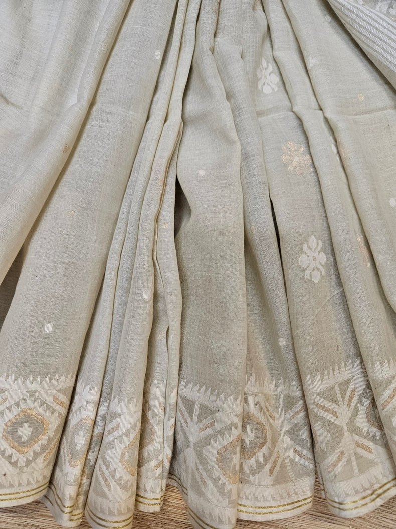 Elegance in Every Thread – Cream & White Handspun Cotton Jamdani Saree with Gold Zari Balaram Saha