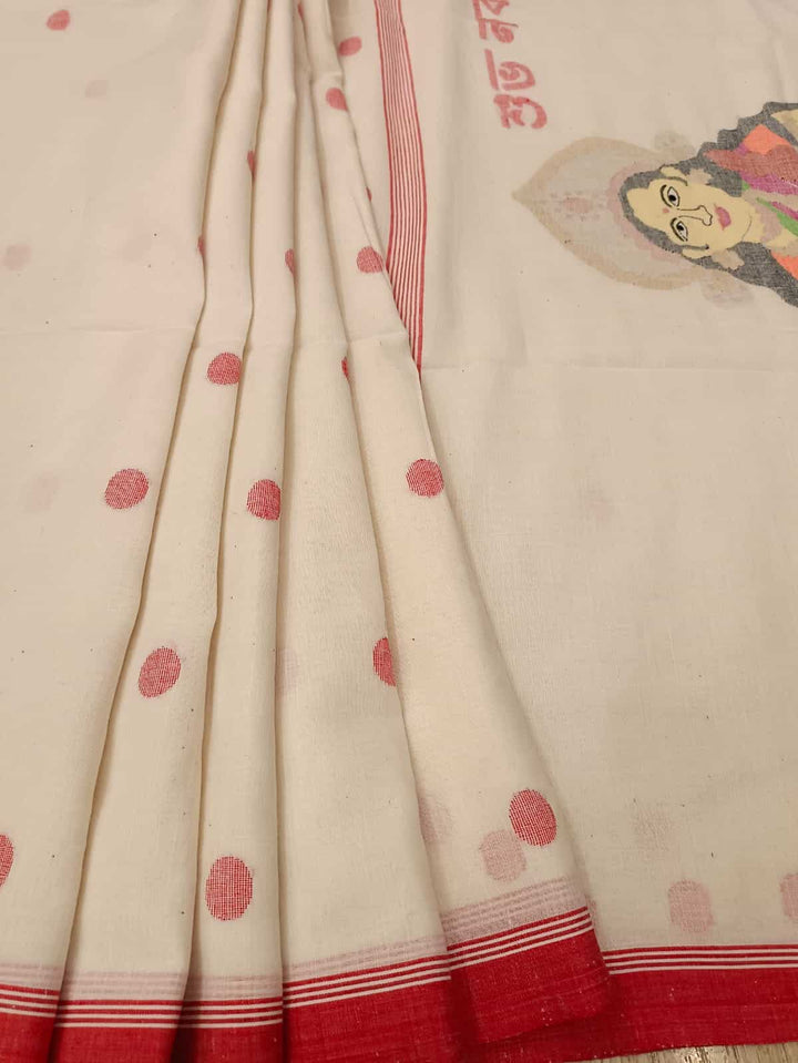 Shubho Nobo Borsho Special Saree: Handspun & Handwoven soft cotton saree in White & Red with goddess Lakshmi & Lord Ganesh handwoven on the Aanchal. All over the body Polka Dot weave. Blouse Piece.