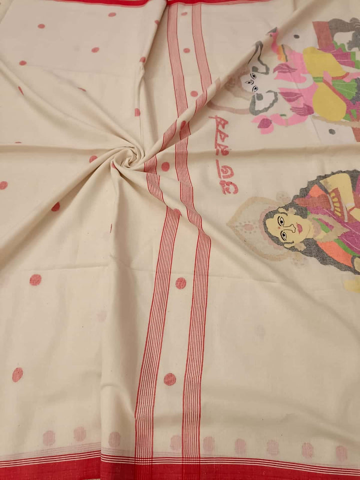 Shubho Nobo Borsho Special Saree: Handspun & Handwoven soft cotton saree in White & Red with goddess Lakshmi & Lord Ganesh handwoven on the Aanchal. All over the body Polka Dot weave. Blouse Piece.
