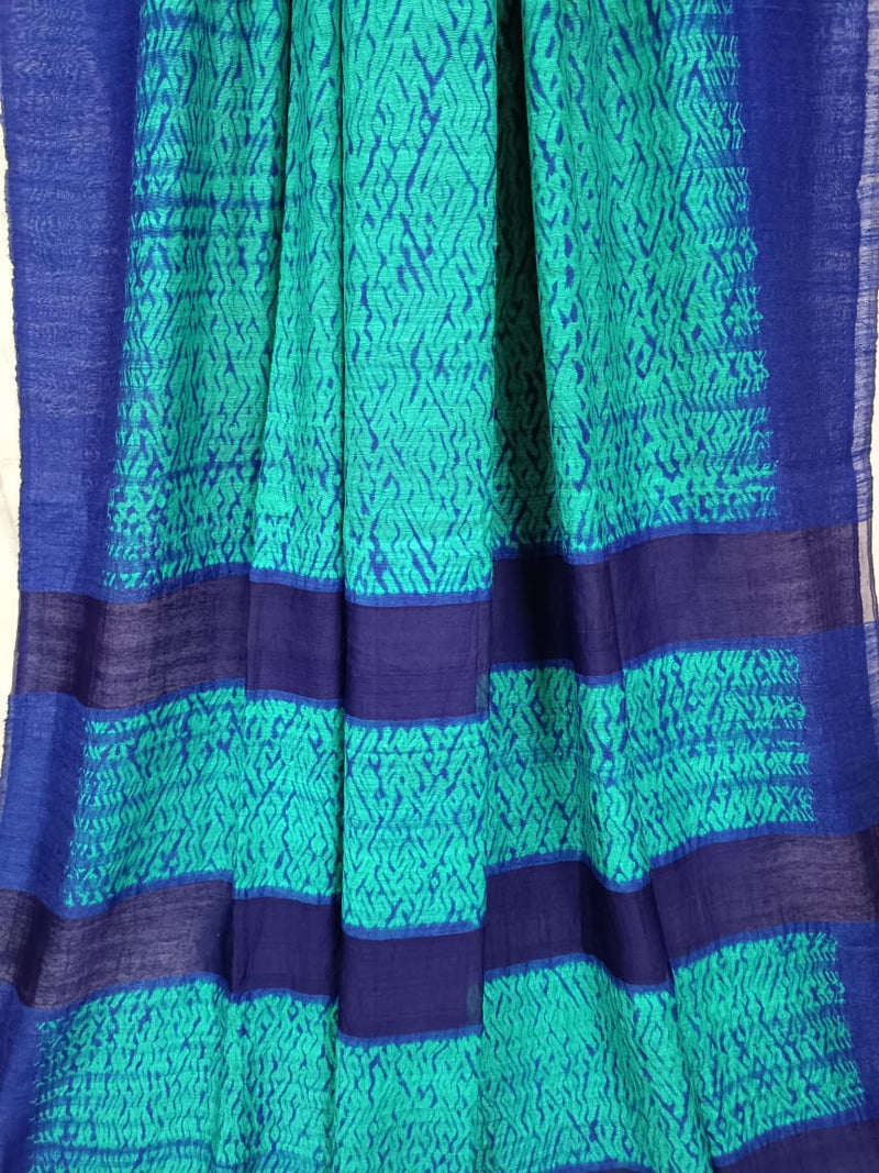 Balaram Saha's Sea Green Chic and Dark Blue: Matka Silk Shibori Saree (handloom saree, silk saree, handloom silk saree, balaram saha online, silk sarees, balaram saha handloom saree store, silk handloom saree, bengal handloom sarees, matka silk, matka silk saree, silk saree online)   https://www.shutterstock.com/